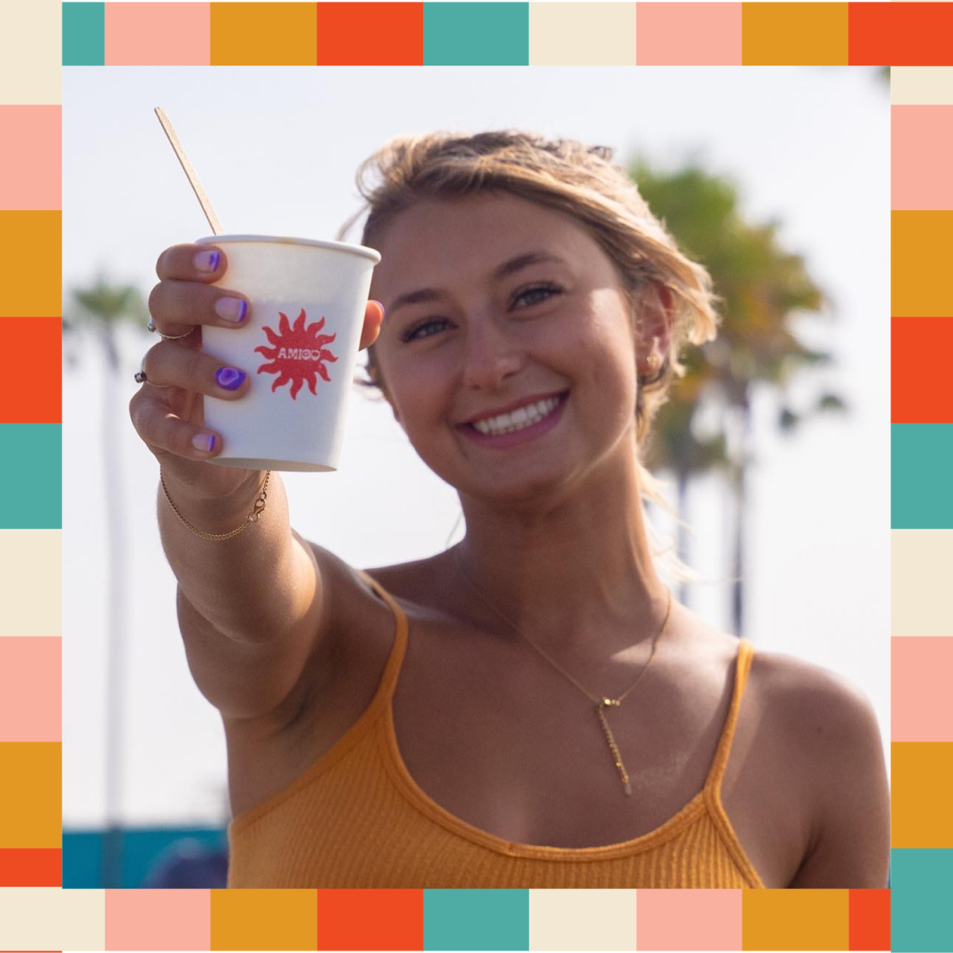 girl with a cup of amigo coffee